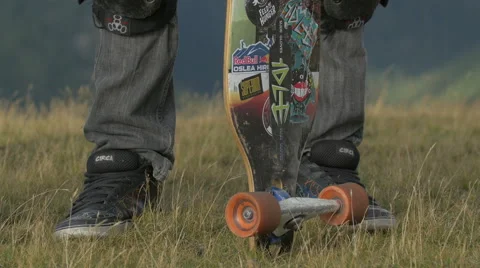 Great view of one longboarder standing on Transalpina Stock Footage 57785559