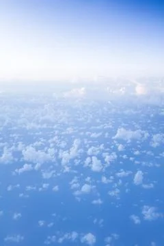 Great view over the clouds with awesome light. Stock Photos