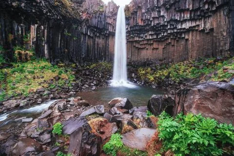 Great view of Svartifoss waterfall. Dramatic and picturesque scene. Popular.. Stock Photos