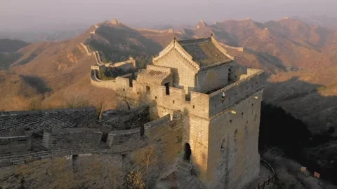 The Great Wall of China watchtower and fortification at sunset 스톡 동영상 346277151