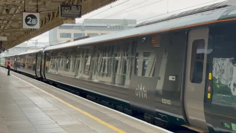 Great Western Railway Class 800 high speed train leaving Cardiff Central station Stock Footage 337318039