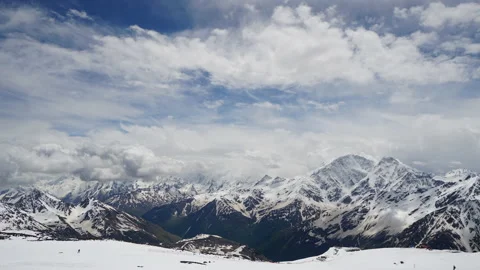 The Greater Caucasus Range with Clouds. Timelapse of Snow-Capped Mountains. Video stock 156341666