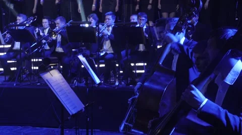 The Greatest Hits by Rock Symphony Double Bass and Wind Instruments Musicians Stock Footage 60227201