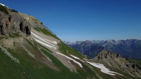 Greean mountains with snow fields Stock Footage 91745683