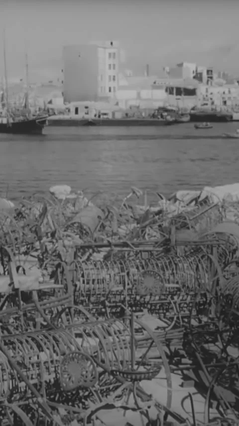 GREECE - 1940s - Debris on a war-torn harbor in Greece. Stock Footage 342634028