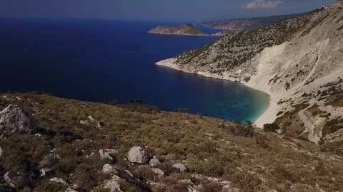 Greece Beach Aerial Looking Down Over Cliff Tilt Down 스톡 동영상 101275956
