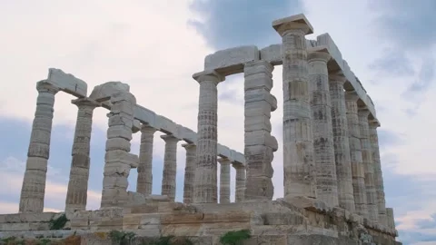 Greece Cape Sounio with ruins of ancient temple of Poseidon at sunset. Ancient Stock Footage 315859629