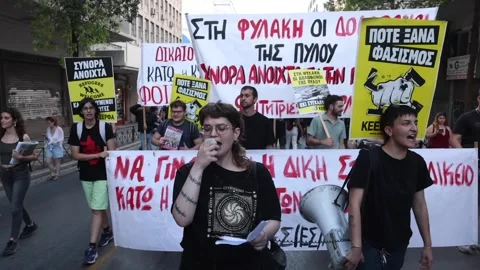 Greece: Demonstrators rally in Athens on 3rd anniversary of deadly Pylos ... Stock Footage 337264855