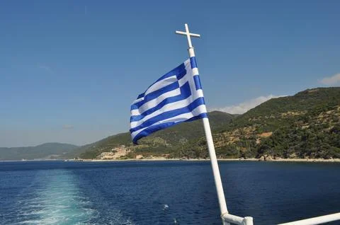 Greece flag on the flagpole Foto stock