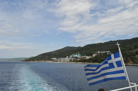 Greece flag on the flagpole Stock Photos