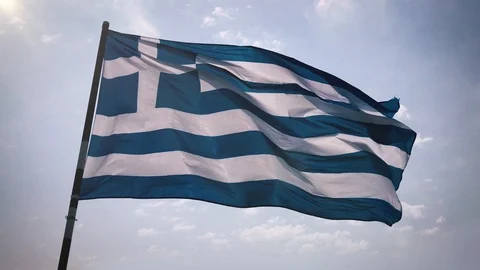 Greece flag fluttering in the sun Видео 112251484