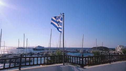 Greece flag waving in front of the sea. Stock Footage 95836622