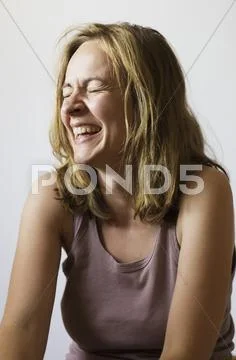Greece, Ionian Islands, Ithaca, Mid adult woman smiling, close up Stock Photos