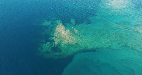 Greece Rocky coast of peninsula. Pattern of sea surface and rocky shore Stock Footage 238529635