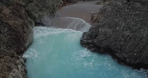Greece Secluded Beach Surrounded by Cliffs Drone Shot Stock Footage 106339508