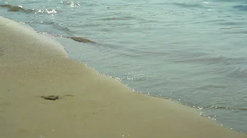 Greece. Waves spreading on sea beach with fine wet sand Stock-Footage 114888980
