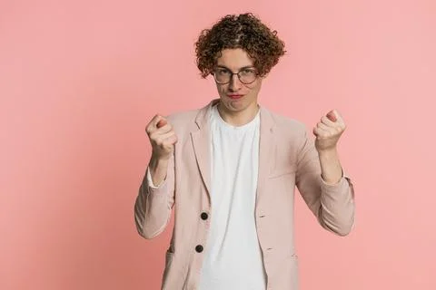 Greedy avaricious man showing fig negative gesture you don't get anyway, refusal Fotos de archivo