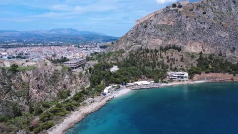 Greek Beach with Trees, Cliffs, and Clear Mediterranean Waters Near Nafplio 스톡 동영상 312664942