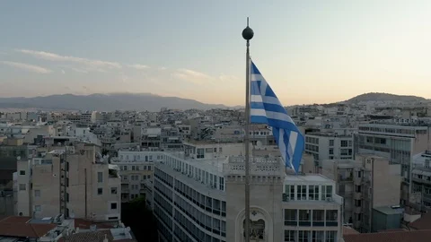 Greek Flag Athens Greece in Background Sunrise Drone Aerial 4K Stock Footage
