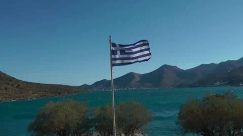 Greek flag on the background of the mountains Stock Footage 8974410