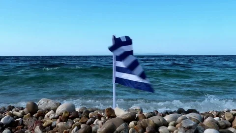 Greek flag on the beach Stock Footage 112690972