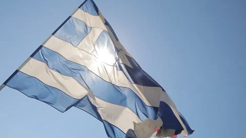 A greek flag close up with sun on the background. Stock Footage 202083317