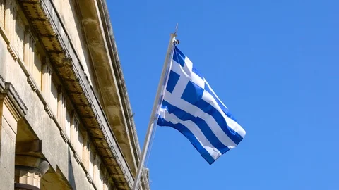 Greek flag waving in the wind, blue sky Stock Footage 120615656