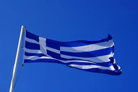 Greek flag in the wind Stock Photos