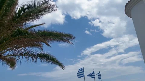 Greek flags on the background of the blue sky Stock Footage 246621530