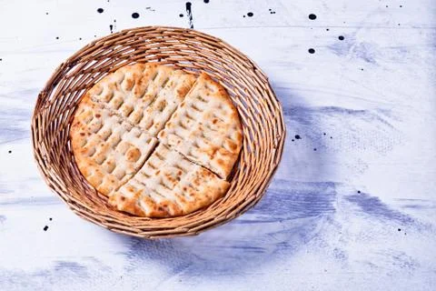 Greek flatbread in basket Stock Photos