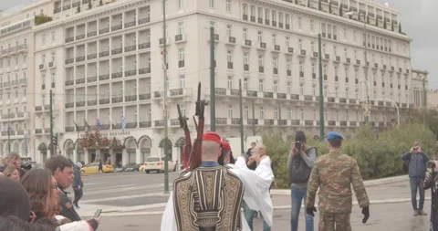 Greek guards march from the back Stock Footage 131972225