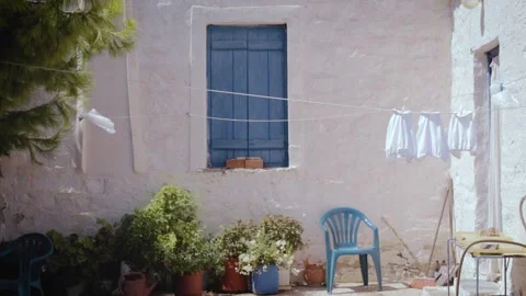 Greek Island yard Vídeos de archivo 330251955