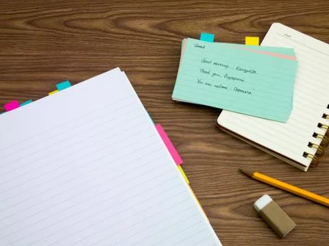 Greek; Learning New Language Writing Words on the Notebook Stock Photos