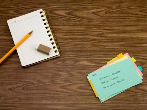 Greek; Learning New Language Writing Words on the Notebook Stock Photos