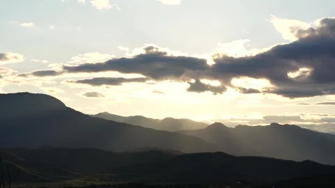 Greek Mountains Epic Sunset Powerful Heavenly Light Spills Out of Sky Throu.. Stock Footage 336515378