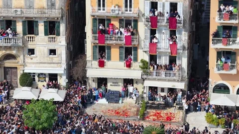 Greek Orthodox Easter Celebration in Corfu: Crowds Watch Traditional Botides Stock Footage 333783865
