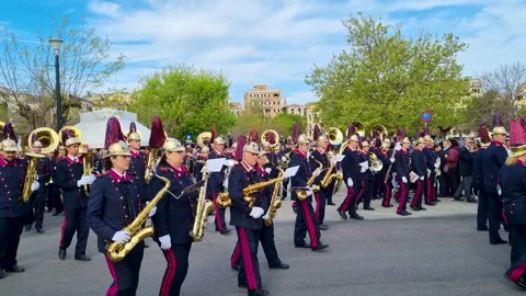 Greek Orthodox Easter Parade Featuring Saxophone Musicians of the Mantzaros Stockbeeldmateriaal 335355557