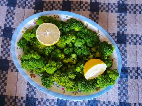 Greek salad with broccoli and lemon Stock Photos