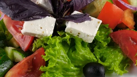 Greek salad, close-up view, fresh tomatoes, cucumber, red onion Stock Footage 81003384