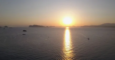 Greek sunset reflection on Ocean Video stock 87567204