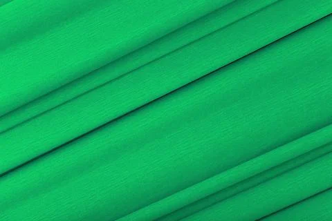 Green abstract background with diagonal lines. Flat lay, copy space Stock Photos