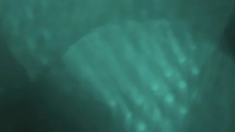 Green abstract bokeh lights, subtle on a background Stock Footage 125649384