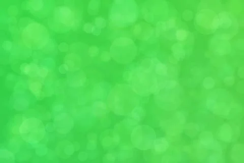 Green abstract defocused background, circle shape bokeh pattern. Illustrazione stock
