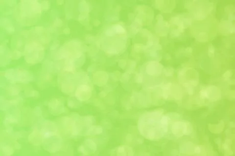 Green abstract defocused background, circle shape bokeh pattern. Foto stock
