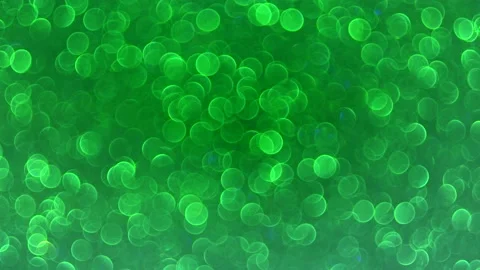 Green abstract motion background shining gold circles. Video stock 143799736