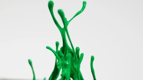 Green abstract paint splatter background Stock Photos