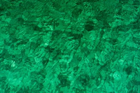Green abstract texture background of emerald green sea water. Top view of gre Stock-Fotos