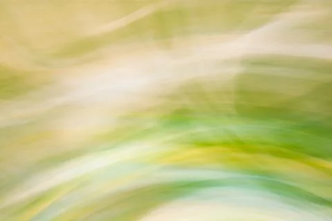 Green abstract waves with a slight blur and a gradient from light to dark ton Stock Photos