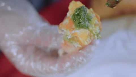 Green ajika over fried egg in the shape of a bear 스톡 동영상 251345905