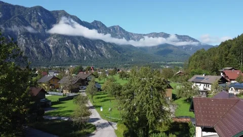 Green alpine mountains and valleys in a serene landscape on a sunny day in the c Video stock 294348744